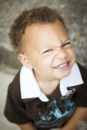 While his parents continued fixing their hair and perfecting their outfits, I snapped this shot of this little guy out on their front porch. 