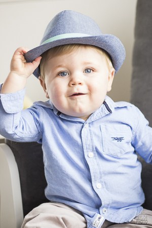 Here is an example of using a big window and a reflector. You can see the glow of the reflector on the camera-left side of this little guy's face.